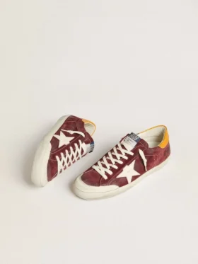 Super-Star pour homme en daim rouge brique avec étoile en cuir blanc et languette au talon à imprimé animalier