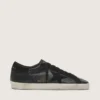 Super-Star pour homme en nappa noir avec étoile et languette de talon en daim noir