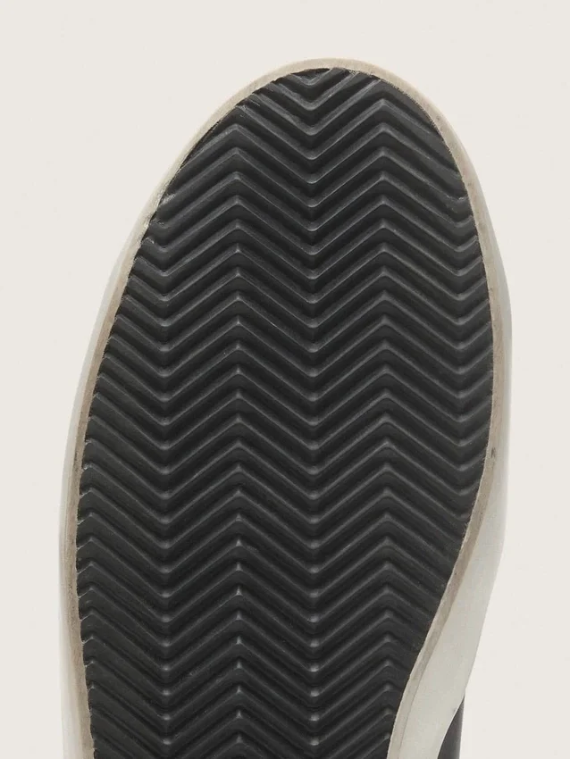 Super-Star pour homme en nappa noir avec étoile et languette de talon en daim noir