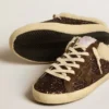 Super-Star Sabot pailleté avec étoile marron et doublure en peau de mouton