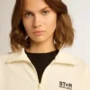 Sweat-shirt blanc à fermeture éclair pour femme, avec bande blanche et étoiles noires