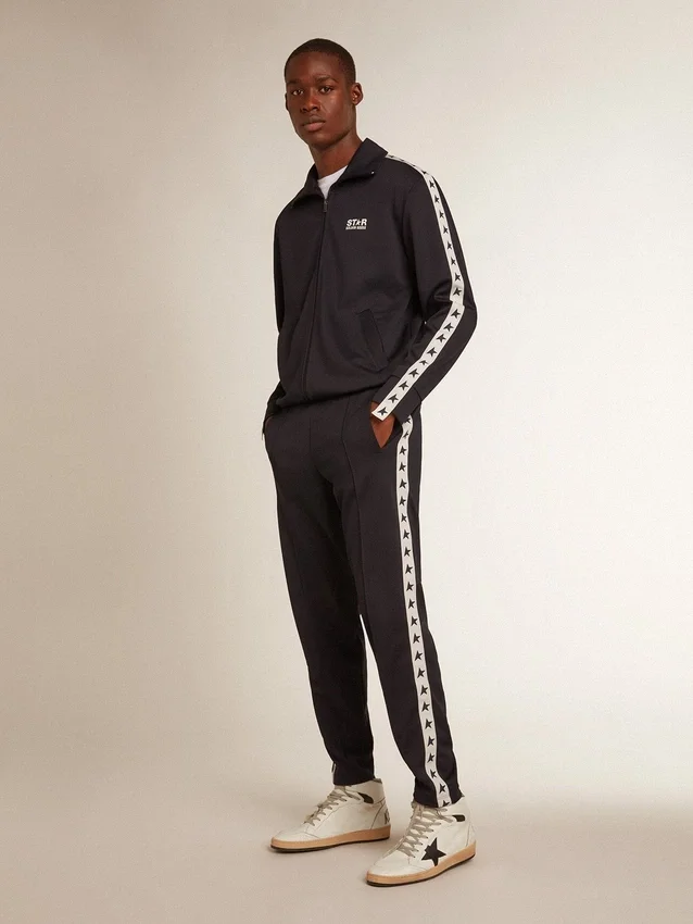 Sweat-shirt bleu foncé avec bande blanche et étoiles bleues contrastantes