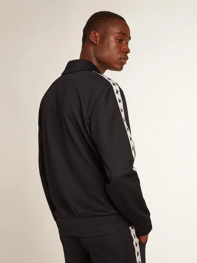 Sweat-shirt bleu foncé avec bande blanche et étoiles bleues contrastantes