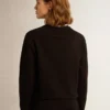Sweat-shirt noir de la Star Collection avec une étoile ton sur ton sur le devant
