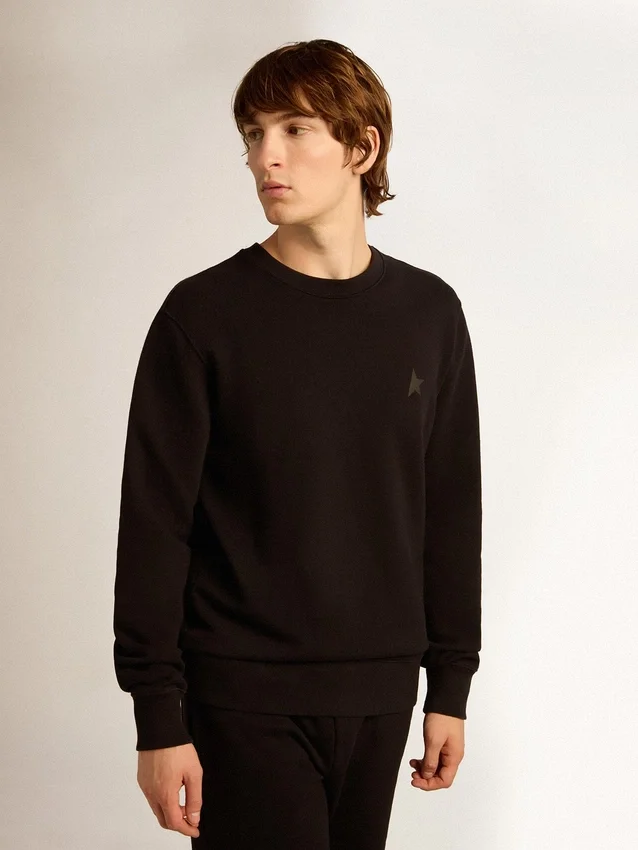 Sweat-shirt noir de la Star Collection avec une étoile ton sur ton sur le devant