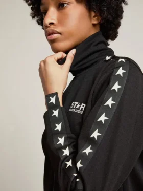 Sweat-shirt noir à fermeture éclair pour femme avec des étoiles blanches