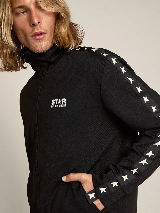 Sweat-shirt noir à fermeture éclair pour homme avec des étoiles blanches