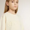Sweat-shirt pour fille de couleur crème avec inscription en patch