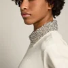 Sweat-shirt zippé blanc « Papyrus » de la Star Collection, avec col orné de cristaux