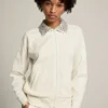 Sweat-shirt zippé blanc « Papyrus » de la Star Collection, avec col orné de cristaux