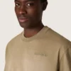 T-shirt unisexe en jersey de coton beige avec logo brodé