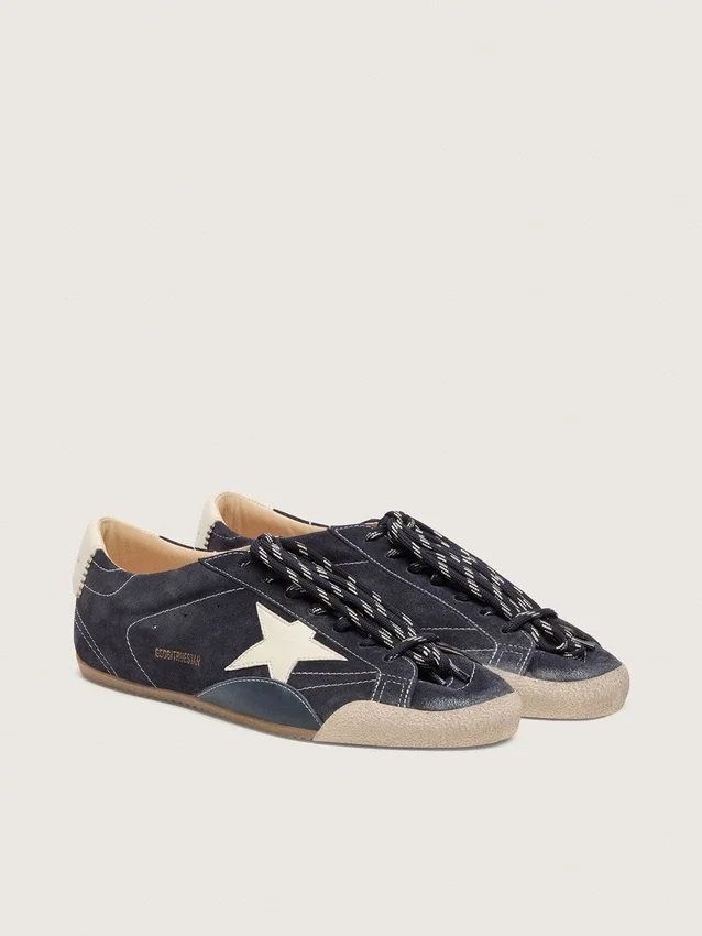 True-Star pour femme en daim bleu foncé avec étoile et languette au talon en cuir nappa blanc