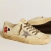 V-Star en nappa écru avec étoile en nappa argenté et broderie perlée