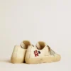V-Star en nappa écru avec étoile en nappa argenté et broderie perlée