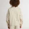 Veste beige pour enfant avec touches multicolores