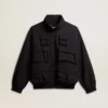 Veste coupe-vent noire à multiples poches