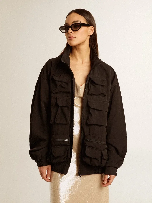 Veste coupe-vent noire à multiples poches
