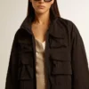 Veste coupe-vent noire à multiples poches