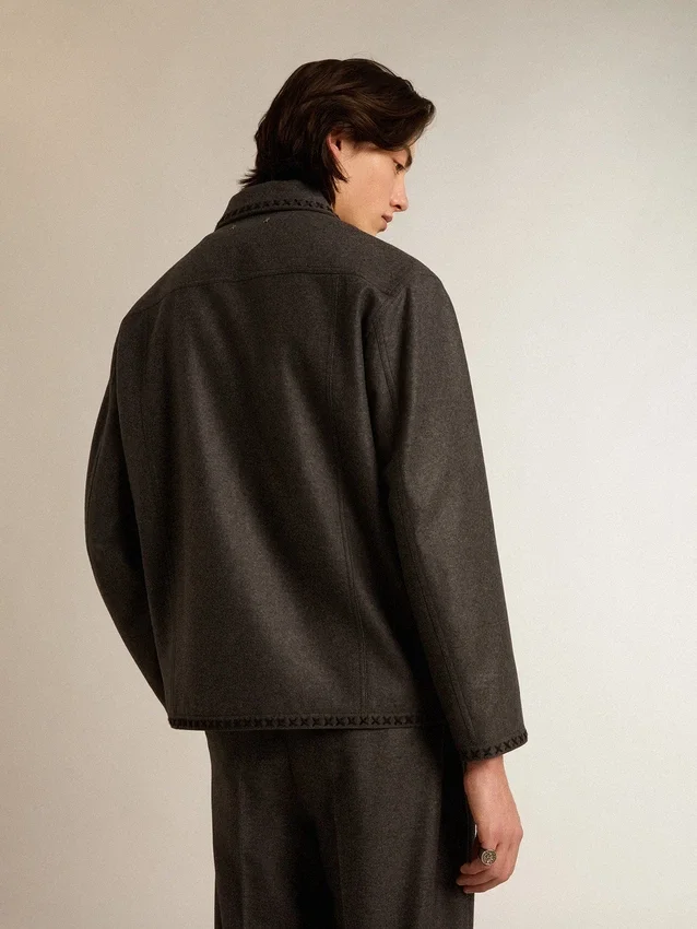Veste en laine gris chiné avec fermeture à boutons