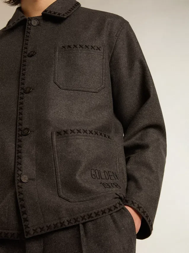 Veste en laine gris chiné avec fermeture à boutons