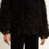 Veste en peau de mouton noire pour femme