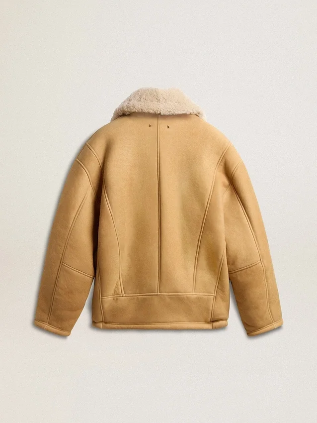 Veste en peau de mouton pour femme avec un large col châle en shearling