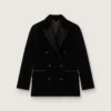 Veste femme à double boutonnage en velours noir avec revers en satin noir