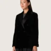 Veste femme à double boutonnage en velours noir avec revers en satin noir