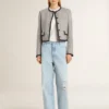 Veste femme en laine et soie grise avec bordures en daim noir