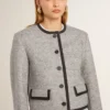 Veste femme en laine et soie grise avec bordures en daim noir