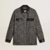 Veste grise à chevrons avec détails en cuir noir