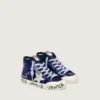Francy Penstar junior en paillettes bleues avec une étoile en daim blanc