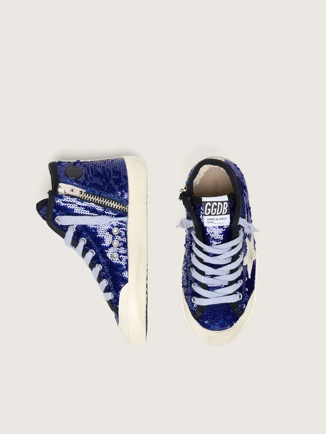 Francy Penstar junior en paillettes bleues avec une étoile en daim blanc