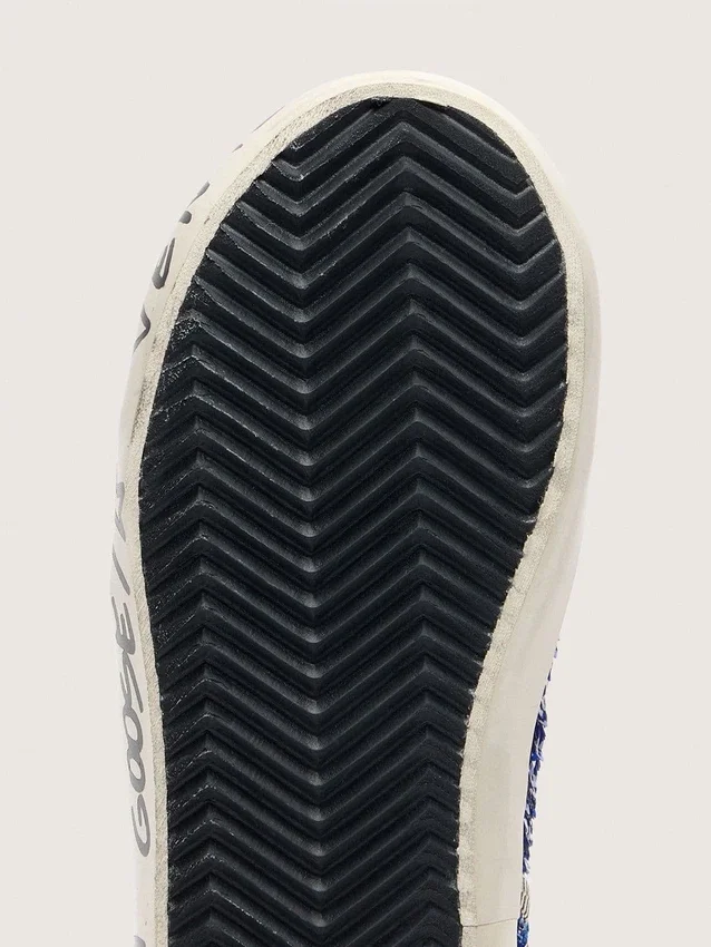 Francy Penstar junior en paillettes bleues avec une étoile en daim blanc